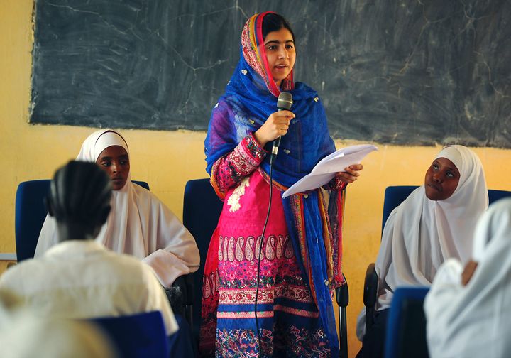 Pakistani activist for female education and the youngest-ever Nobel Prize laureate Malala Yousafzai addresses young refugees at Kenya's sprawling Dadaab refugee complex during a visit organised by the UN High Commissioner for Refugees, in Garissa on July 12, 2016.