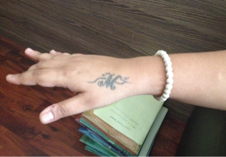 Mani's hand tattoo he got from an underground tattoo artist in Karachi. M is for Mani, and also for first initial of the masc