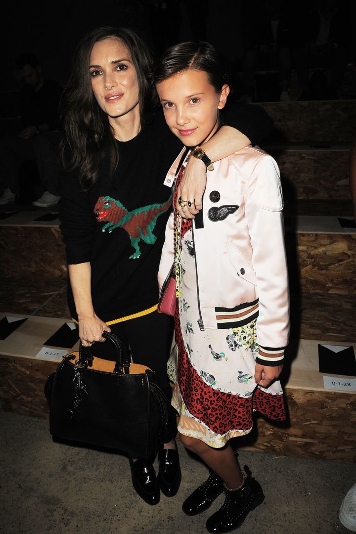Winona Ryder and Millie Bobby Brown attend the Coach 1941 Women's Spring 2017 Show at Pier 76 on Sept. 13 in New York City.