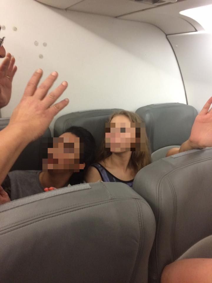 The women are alleged to have hurled racist slurs and threats at their fellow passengers 