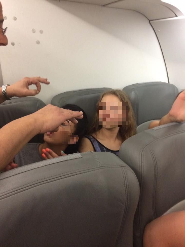 The four women were eventually removed from the flight 