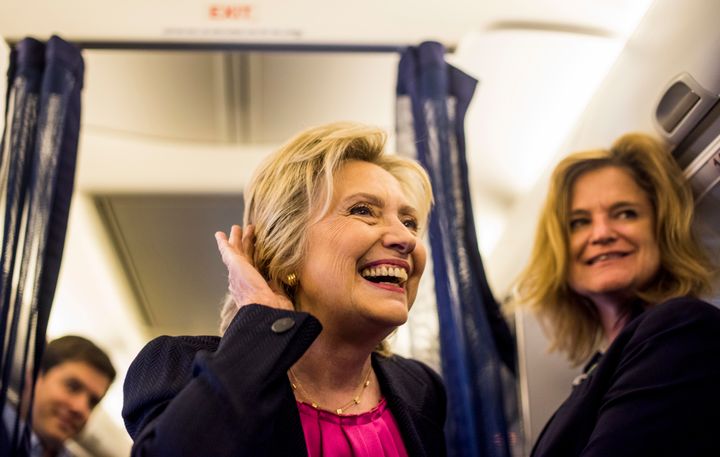 Democratic Nominee for President of the United States former Secretary of State Hillary Clinton briefly says good morning to the press corp aboard her new campaign plane bound for a busy campaign day on Tuesday September 6, 2016.