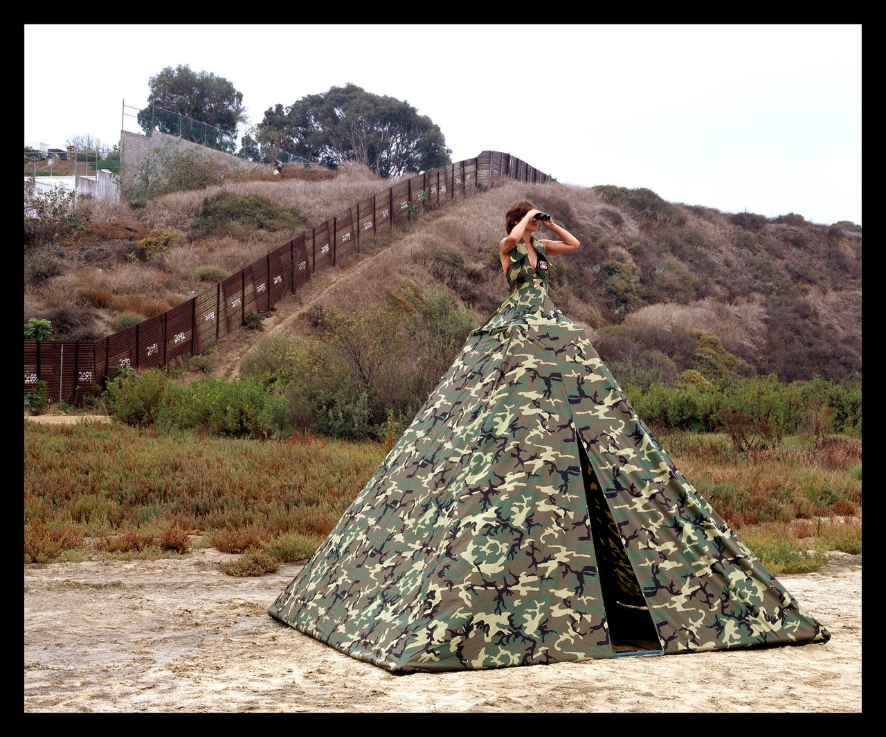 "Ms. Homeland Security, Illegal Entry Dress Tent," Installed beneath the California-Mexico border fence, 2005.