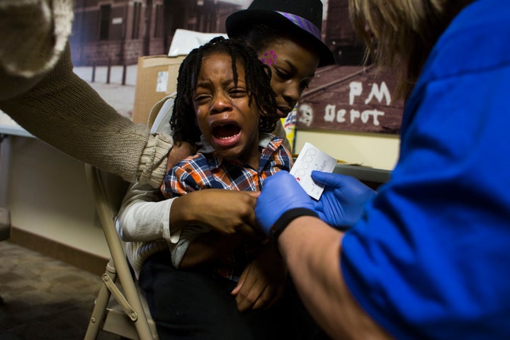 Keeghan Nelson, 4, of Flint, Michigan, gets his blood lead levels tested at Carriage Town Ministries in February. Legislation passed by the Senate could help Flint rebuild its water system, but it faces a long road before it could become law.