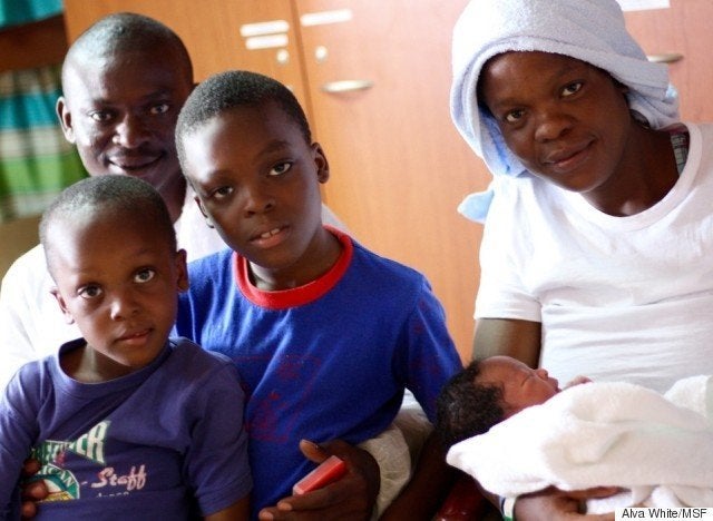 Faith Oqunbor right gave birth to Newman 24 hours after MSF rescued her family from a dinghy crossing the Mediterranean