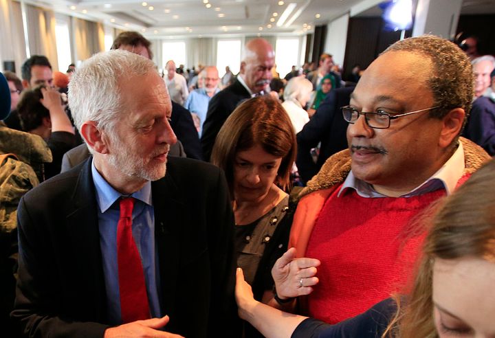 Jeremy Corbyn with Marc Wadsworth (right), who runs Momentum Black Connexions, following a speech on Labour's anti-Semitism inquiry findings