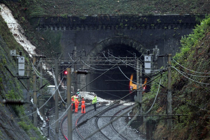 <strong>Workers at the landslip near Watford Junction station</strong>