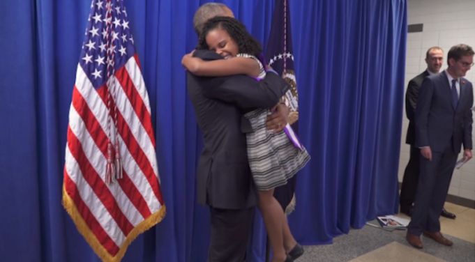 The pair embraced after Obama said kids like Mari were 'what make me so optimistic for the future'