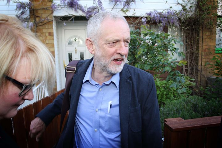 <strong>Jeremy Corbyn is met with a group of journalists leaving his Islington home. </strong>