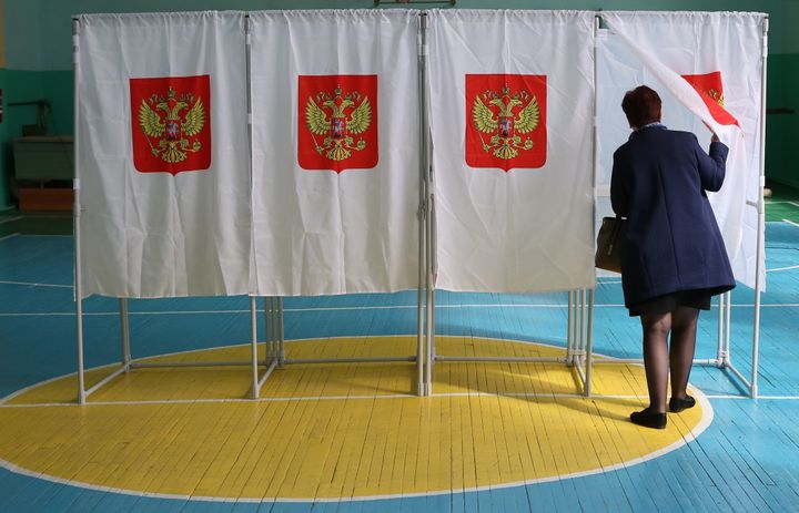 A woman at a polling station during the 2016 Russian parliamentary election.