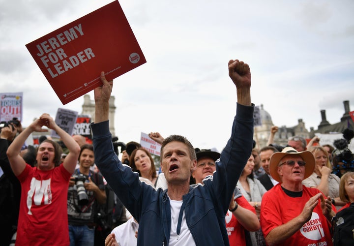 Momentum supporters at a Keep Corbyn rally