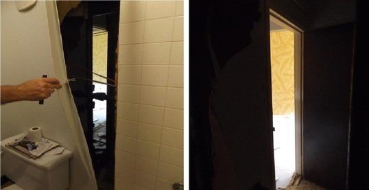A false wall is seen inside of an Oklahoma halfway house's bathroom.