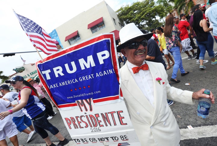 Cuban exile Santiago Portal shows off his support for Donald Trump earlier this year in Miami's Little Havana. The first general of exiles is the one group of Latinos that supports the GOP presidential candidate, who is strongly disliked by Hispanics generally.