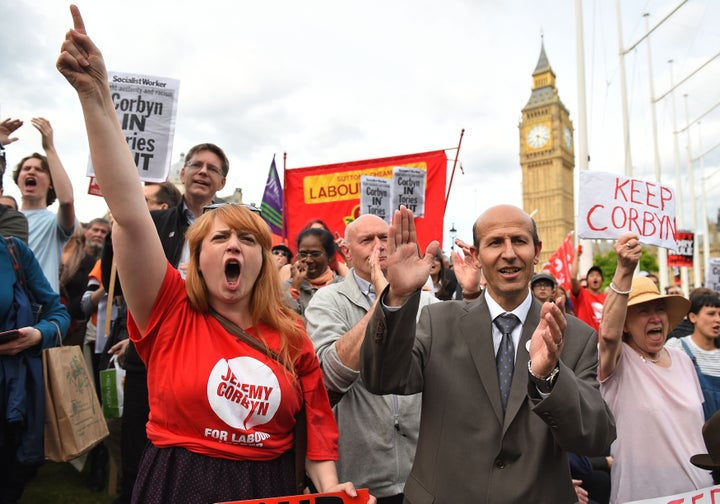 <strong>The Momentum campaign group holds a "Keep Corbyn" demonstration outside the Houses of Parliament.</strong>