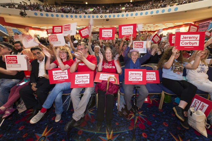 Corbyn supporters at a rally in Ruach City Church, organised by Momentum.