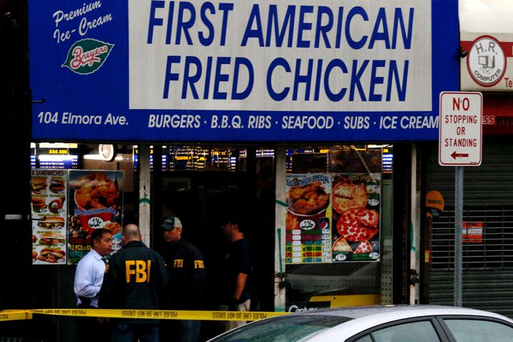 FBI personnel search an address Monday during an investigation into Ahmad Khan Rahami, who was wanted for questioning in an explosion in New York, which authorities believe is linked to the explosive devices found in New Jersey.