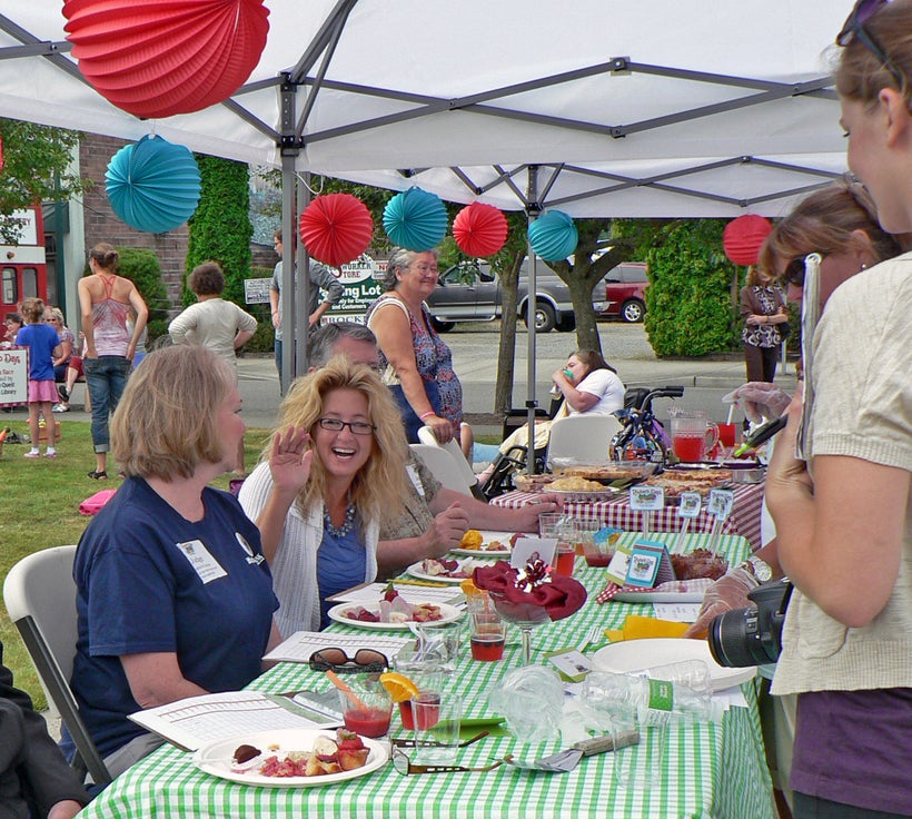 Judges enjoying Sumner's annual Rhubarb Pie Festival