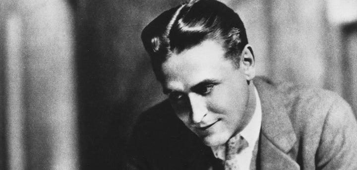 F. Scott Fitzgerald with slicked back hair and what looks to be a middle part.