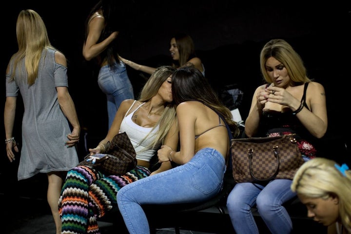 "They don’t care about the conflict around them ― they just live their life," the photographer said of the pageant's 12