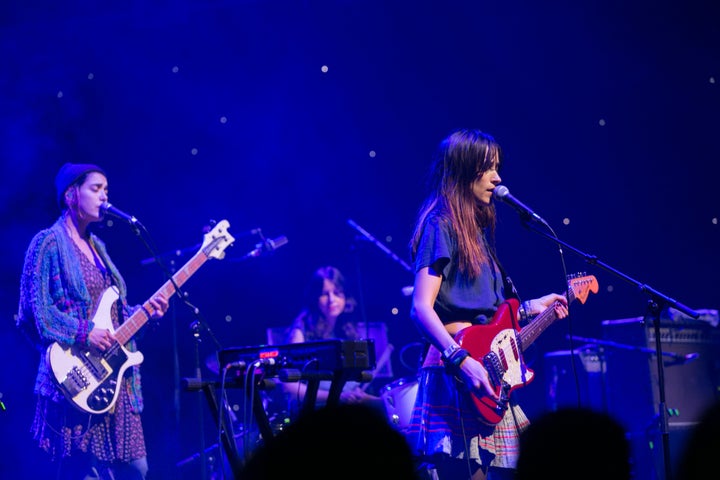 Jenny Lee Lindberg, Stella Mozgawa and Theresa Wayman of Warpaint perform on Aug. 23 in Dublin, Ireland.