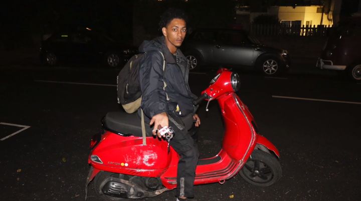 Student Adair-Whyte on his moped.