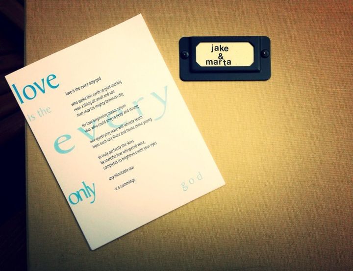 A copy of our homemade wedding invitation (featuring a poem by e.e. cummings) & photo album
