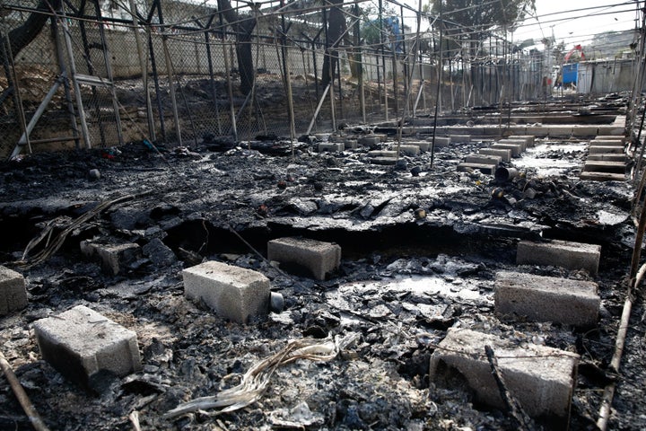 Moria lies in ruins after a night of riots and an inferno that destroyed much of the camp. 