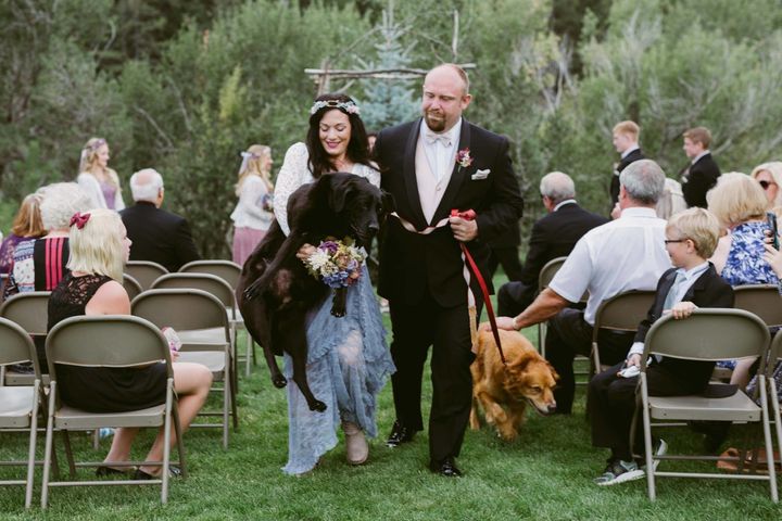 Maid of honor Katie Lloyd helped Charlie Bear make his way back down the aisle. 