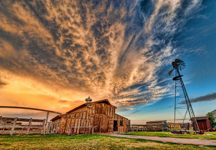 Farmstead at sunset.