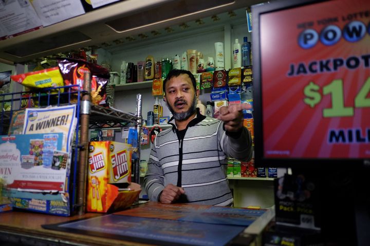 Muslim shopkeeper Sarkar Haq, who was beaten in an alleged hate crime, speaks during an interview at his shop in New York on December 7, 2015.