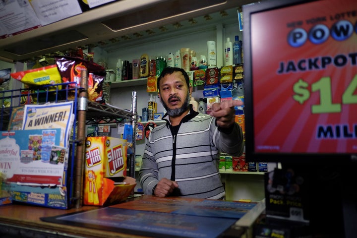 Muslim shopkeeper Sarkar Haq, who was beaten in an alleged hate crime, speaks during an interview at his shop in New York on