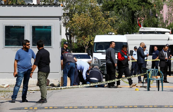 Police forensic experts examine in front of the Israeli Embassy in Ankara, Turkey, on Wednesday.