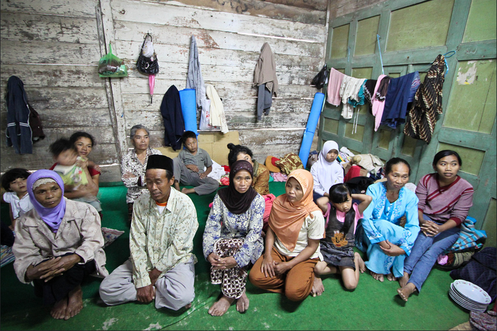 Ketep Village took in a number of individuals displaced by the Merapi volcano. More than 60 men, women and children stayed in this particular room, and there were many rooms like this one throughout the village. Yogyakarta, Indonesia, 2010.