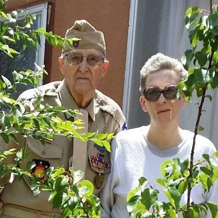 A fundraiser is underway for decorated WWII veteran Dennis Ferk (pictured with his daughter, Denise) after two of his caregivers allegedly stole all of his savings and retirement money.