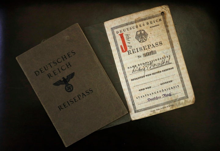 The old German passports of Ludwig (L) and Hermine Sara Rosenthal, the grandparents of London rabbi Julia Neuberger, are seen at the West London Synagogue in London, Britain Sept. 20.