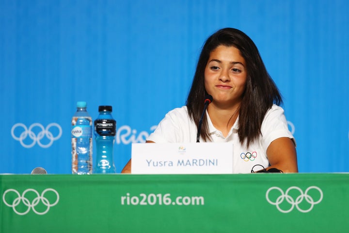 RIO DE JANEIRO, BRAZIL - JULY 30: Yusra Mardini, a Syrian swimmer, who now represents the team of Refugee Olympic Athletes (ROA) speaks to the media at the Olympic Refugee Team Press Conference during the Olympics preview day - 6 at the Barra Olympic Park on July 30, 2016 in Rio de Janeiro, Brazil.