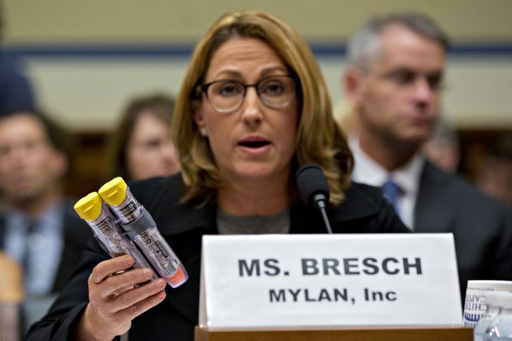 Mylan CEO Heather Bresch holds up Mylan's EpiPen medication while speaking during a House Committee on Oversight and Government Reform hearing in Washington on Sept. 21, 2016.