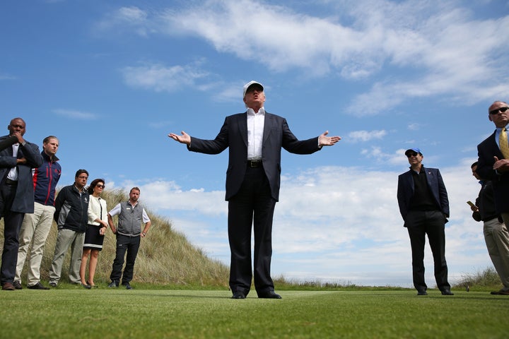 Trump speaks to the media on the golf course at his Trump International Golf Links in Aberdeen, Scotland on June 25.