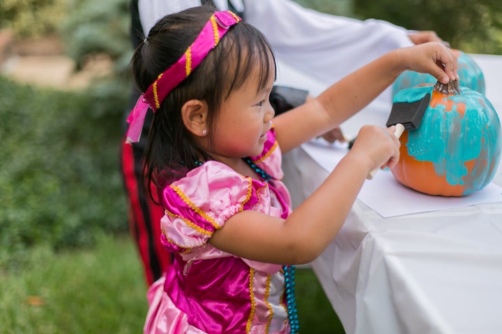 Participants place teal pumpkins in front of their homes to indicate that they will pass out non-food treats on Halloween.