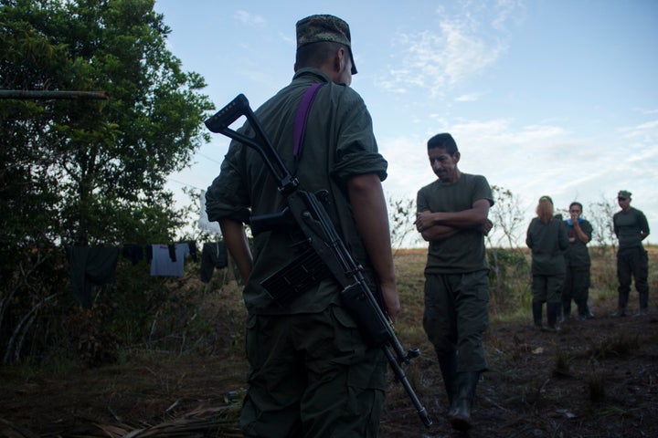 Guerrillas from FARC EP meet in the early morning to get to work in Llanos del Yari, a town in an Indigenous region of southern Colombia on 21 Sept. 2016.