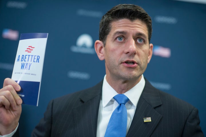 House Speaker Paul Ryan (R-Wis.) holds up a pamphlet promoting the GOP's new policy ideas, which he would much rather talk ab