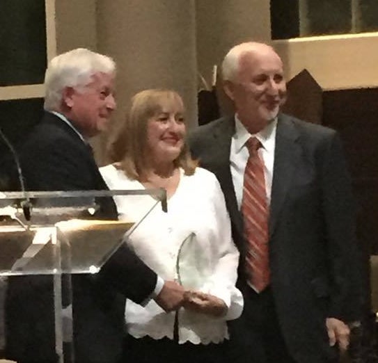 Andrea Bolender with Assemblyman Chuck Lavine (L), and Steven Markowitz (R), Chairman of the Board of HMTC
