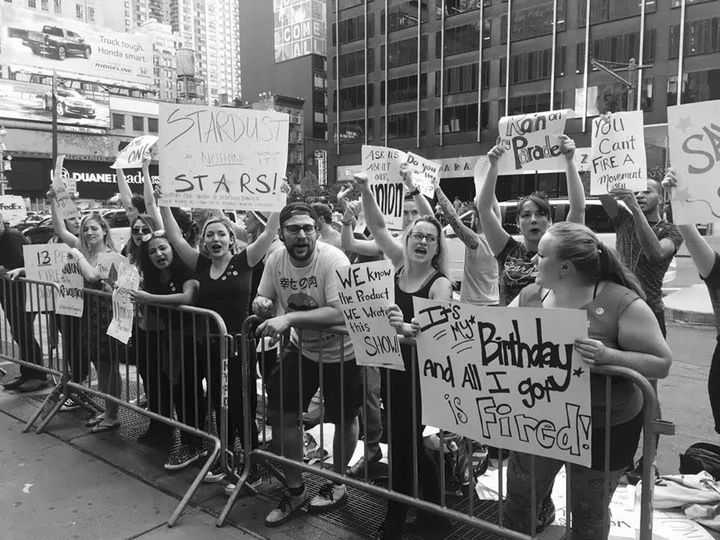 The members of Stardust Family United protest outside of Ellen's Stardust Diner.