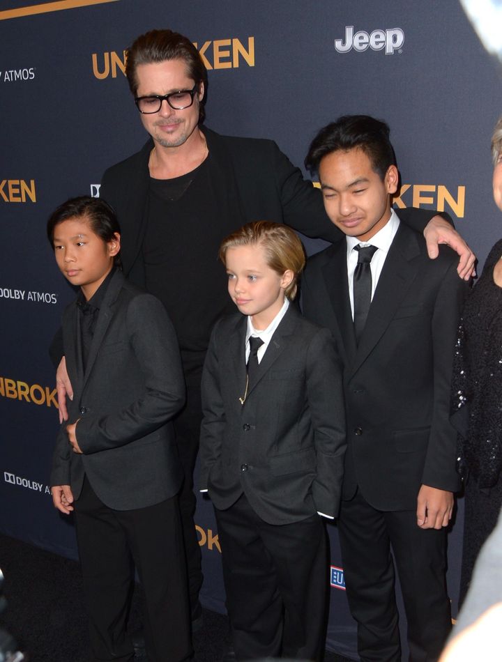 <strong>Brad Pitt with his children, Pax, Shiloh and Maddox in 2014</strong>