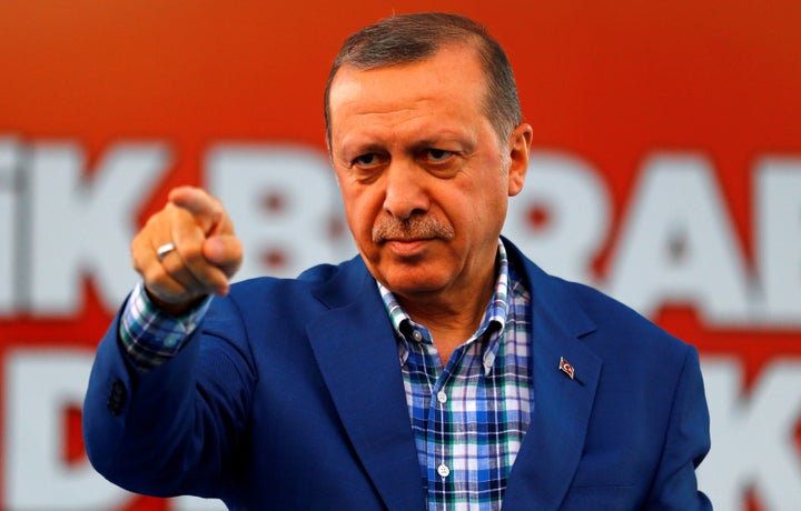 Turkey's President Tayyip Erdogan points at the United Solidarity and Brotherhood rally in Gaziantep, Turkey, August 28, 2016