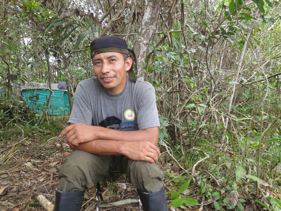 FARC fighter Roberto M&eacute;ndez sits outside a guerrilla camp near where the FARC held its 10th conference, in the Yari Pl