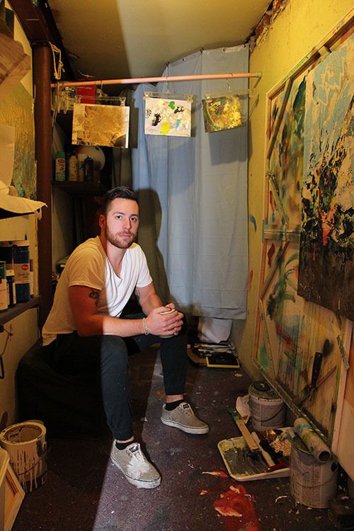 <p><strong>Angelo in his basement art studio.</strong></p>
