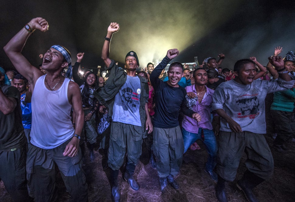 FARC guerrillas dance during a cultural event held at their encampment in the Yari Plains. Sept. 21.