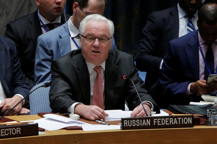 Russian ambassador Vitaly Churkin insisted its air strikes were aimed at 'terrorists' who were holding 200,000 people prisoner in the city