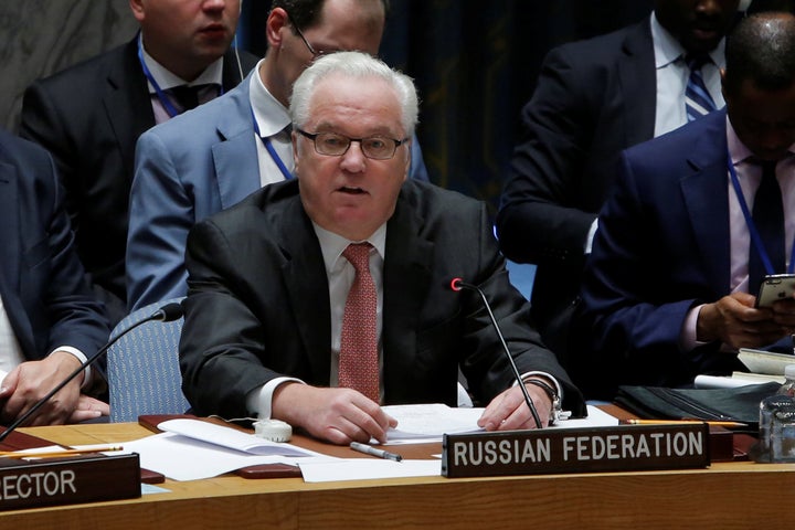 <strong>Russian ambassador Vitaly Churkin insisted its air strikes were aimed at 'terrorists' who were holding 200,000 people prisoner in the city</strong>